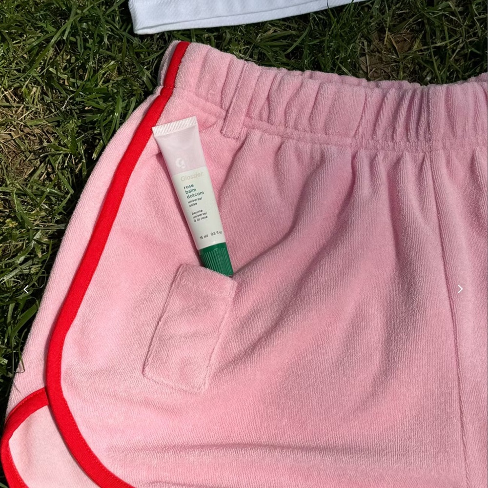 Glossier Pink Athletic Shorts with Red Trim